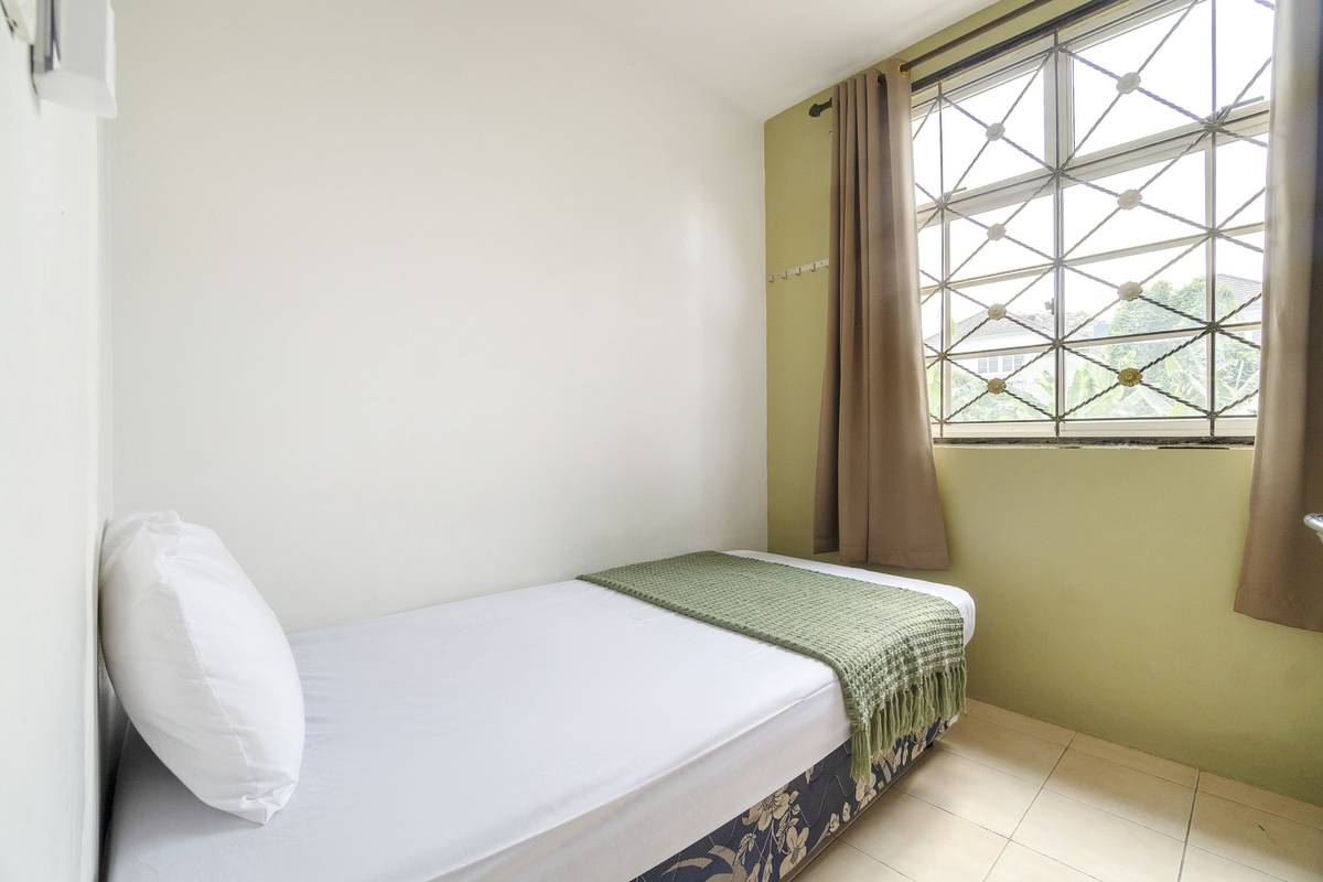 Rukita Woody C Karawaci